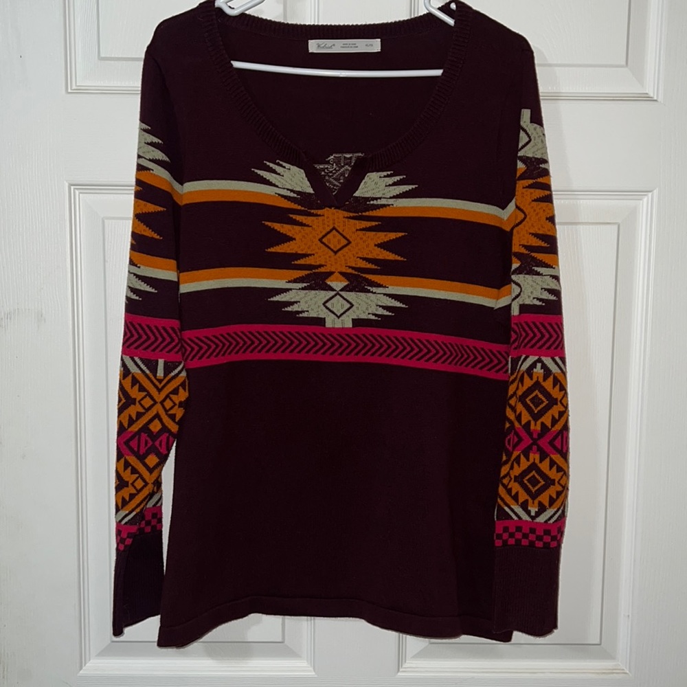 Woman’s size XL woolrich v-neck sweater.